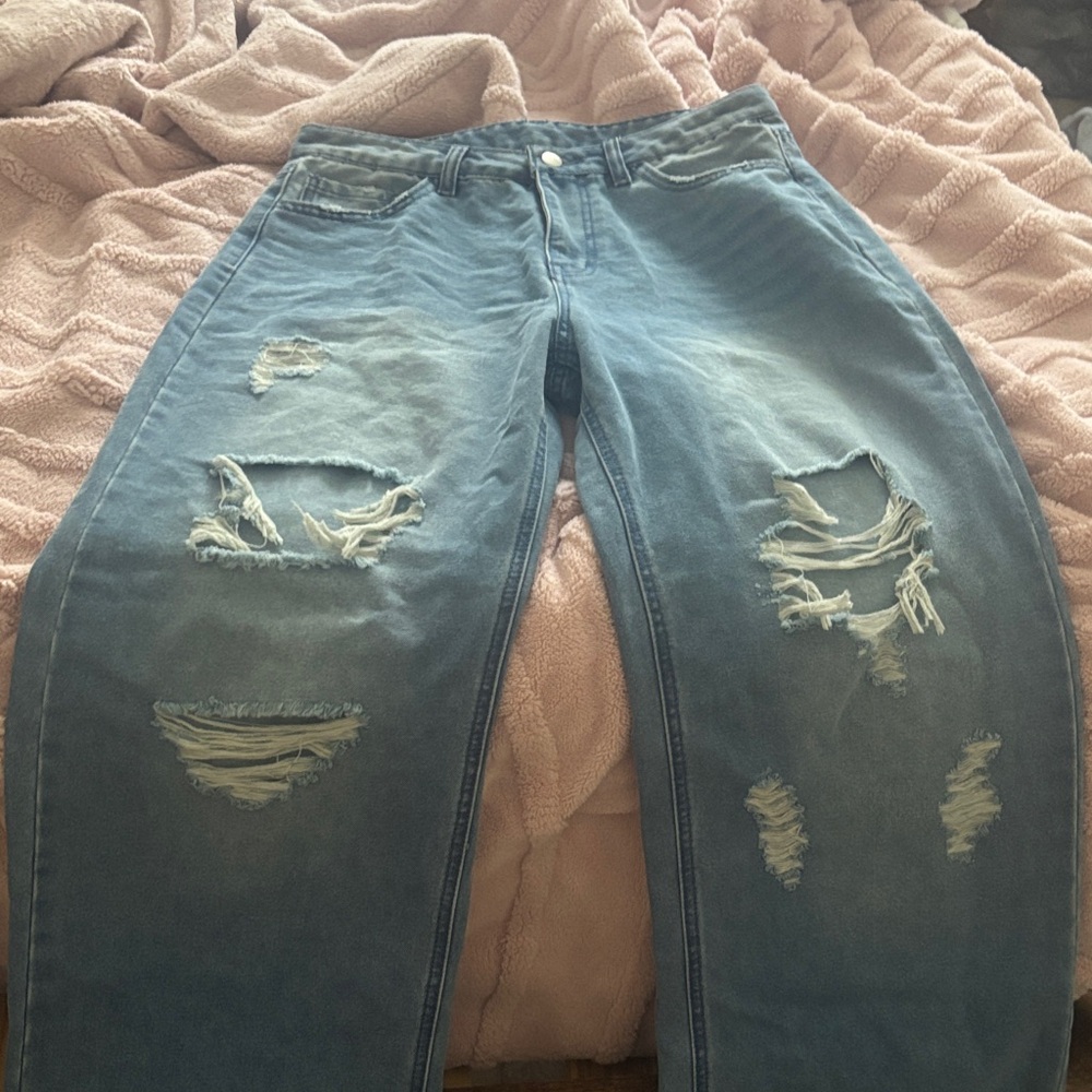 Distressed Light Blue Ripped Jeans